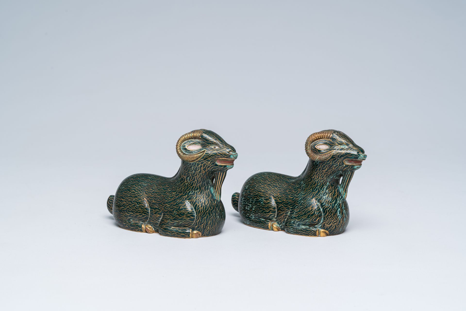 A pair of Chinese cloisonne models of rams, 20th C. - Image 8 of 8
