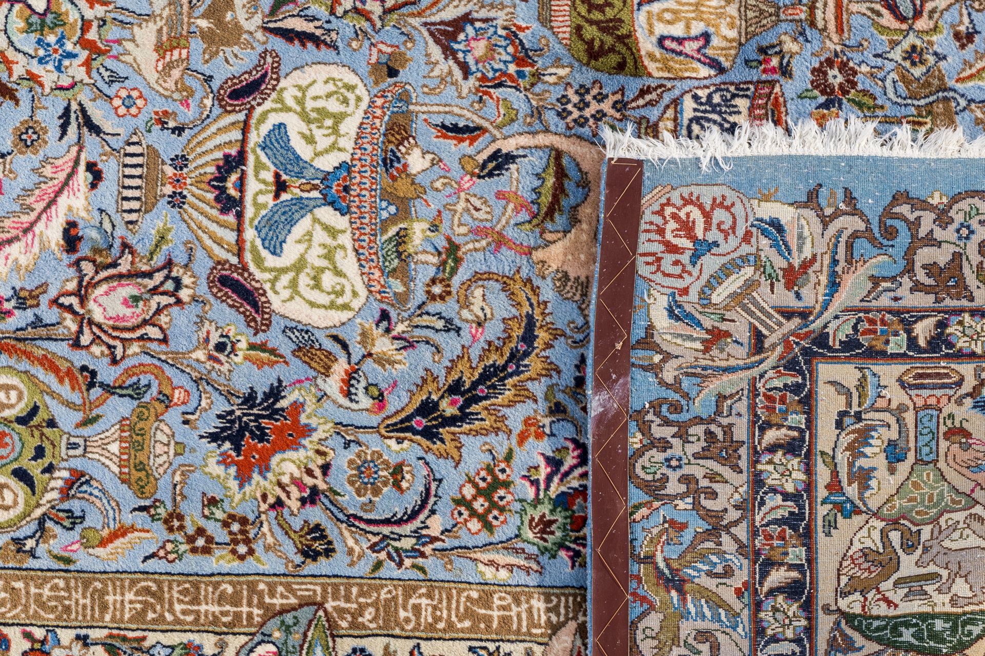 A large Iranian Kashmir rug with antiquities, animals and floral design, wool on cotton, 20th C. - Image 2 of 2