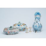 Two polychrome French Rouen faience tureens and covers, a pair of egg cups and a wall fountain, 18th