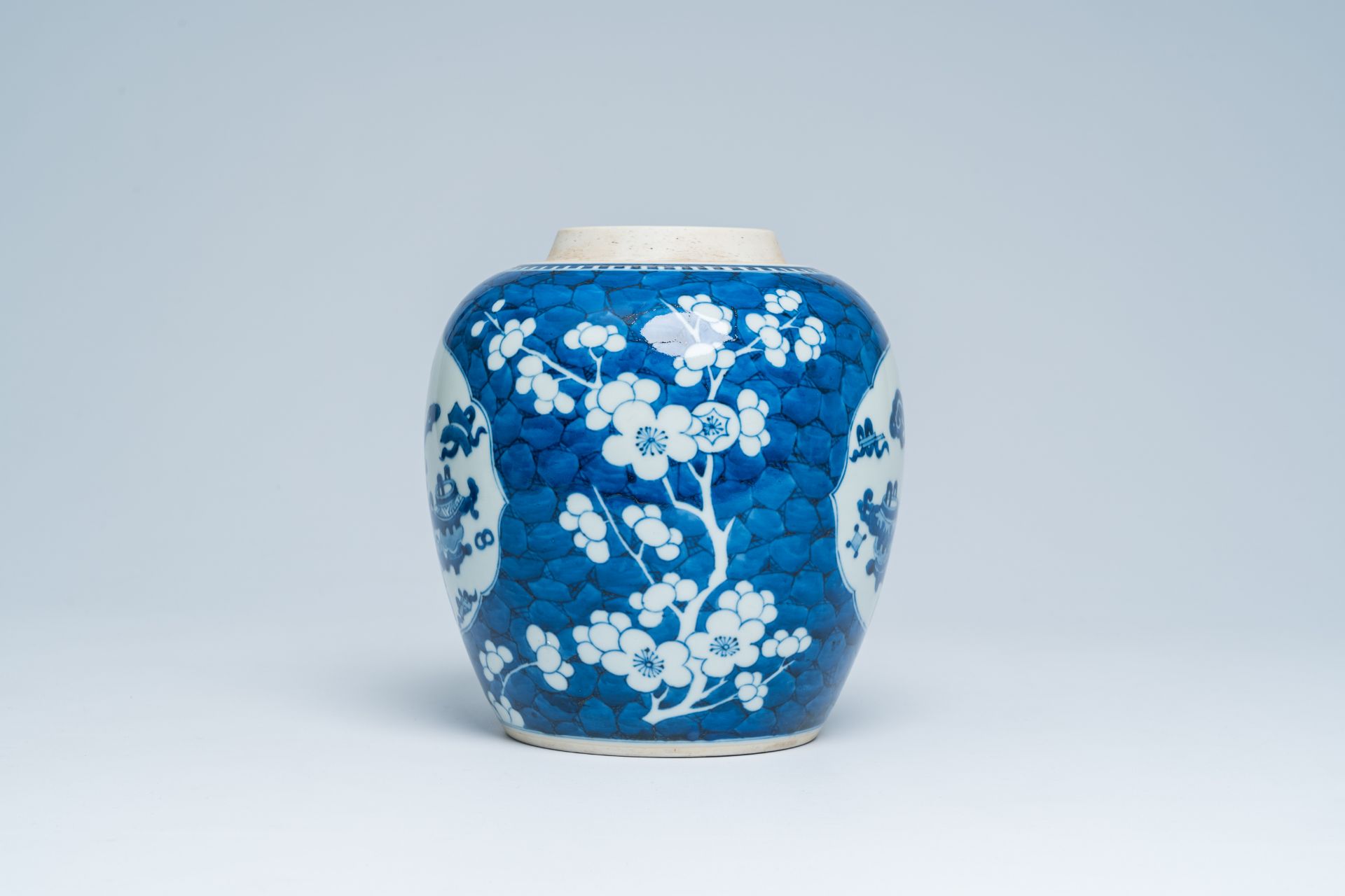 A Chinese blue and white prunus on cracked ice ground ginger jar with antiquities, 20th C. - Image 2 of 15