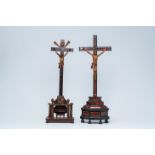 Two Flemish wood Corpi Christi mounted on a crucifix, one cross with tortoiseshell veneer, 17th/18th