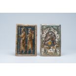 Two luster-glazed relief decorated Qajar tiles with figures, Iran, 19th C.