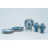 Three Dutch Delft blue and white vases and two strainers on stands, 17th/19th C.