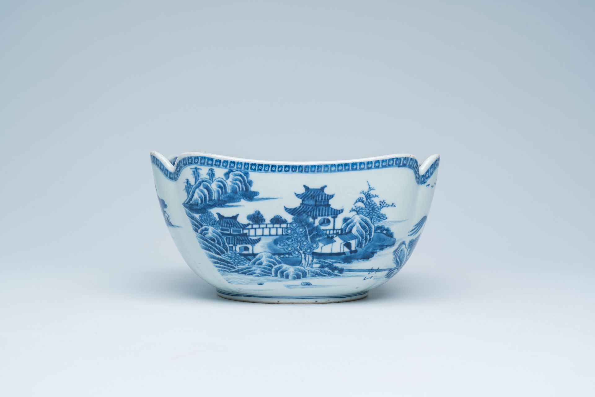 A Chinese blue and white salad bowl with an animated river landscape, 19th C. - Image 5 of 17