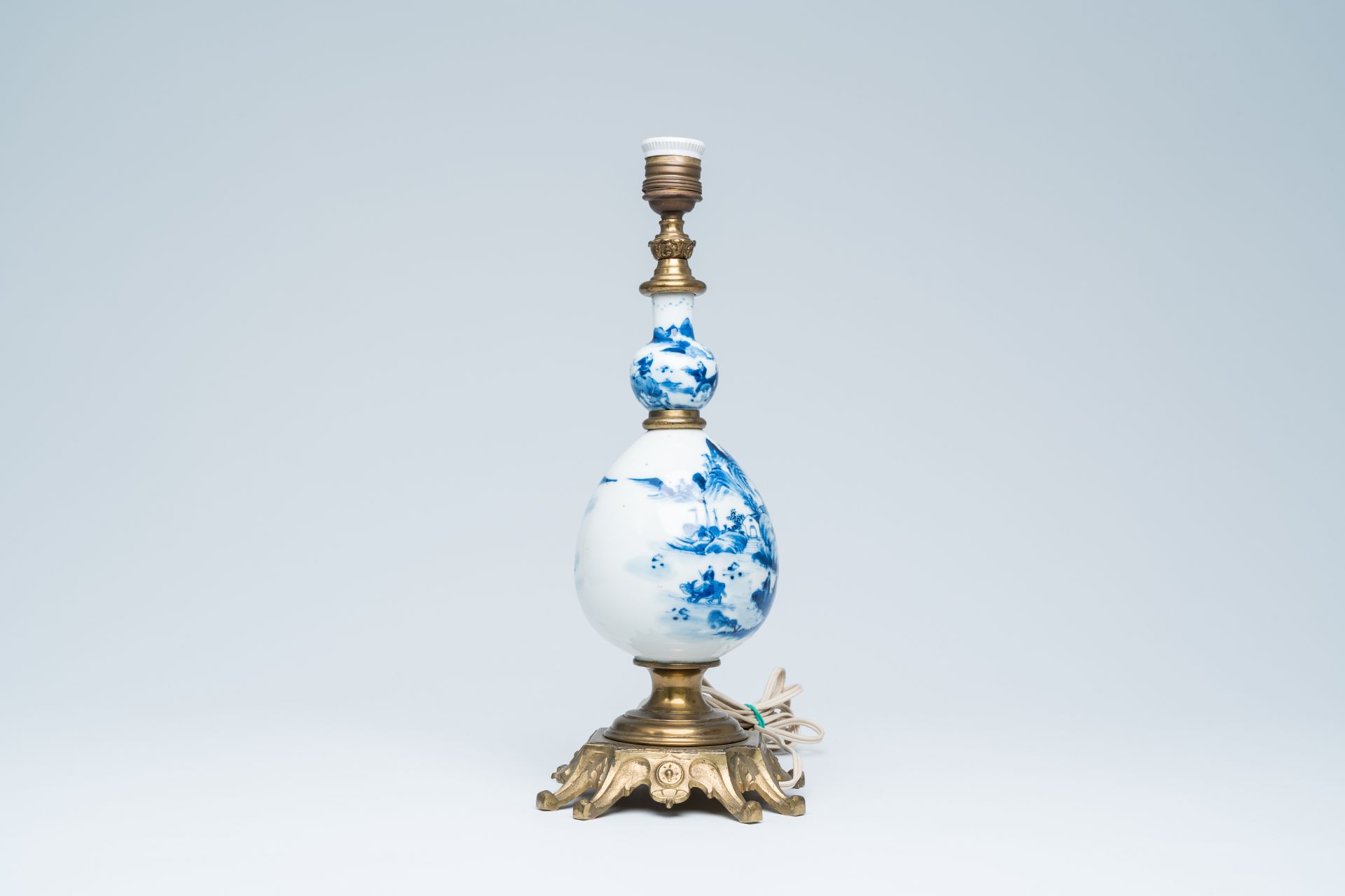 A Chinese blue and white bottle shaped vase with an animated river landscape mounted as a lamp, 19th - Image 3 of 13