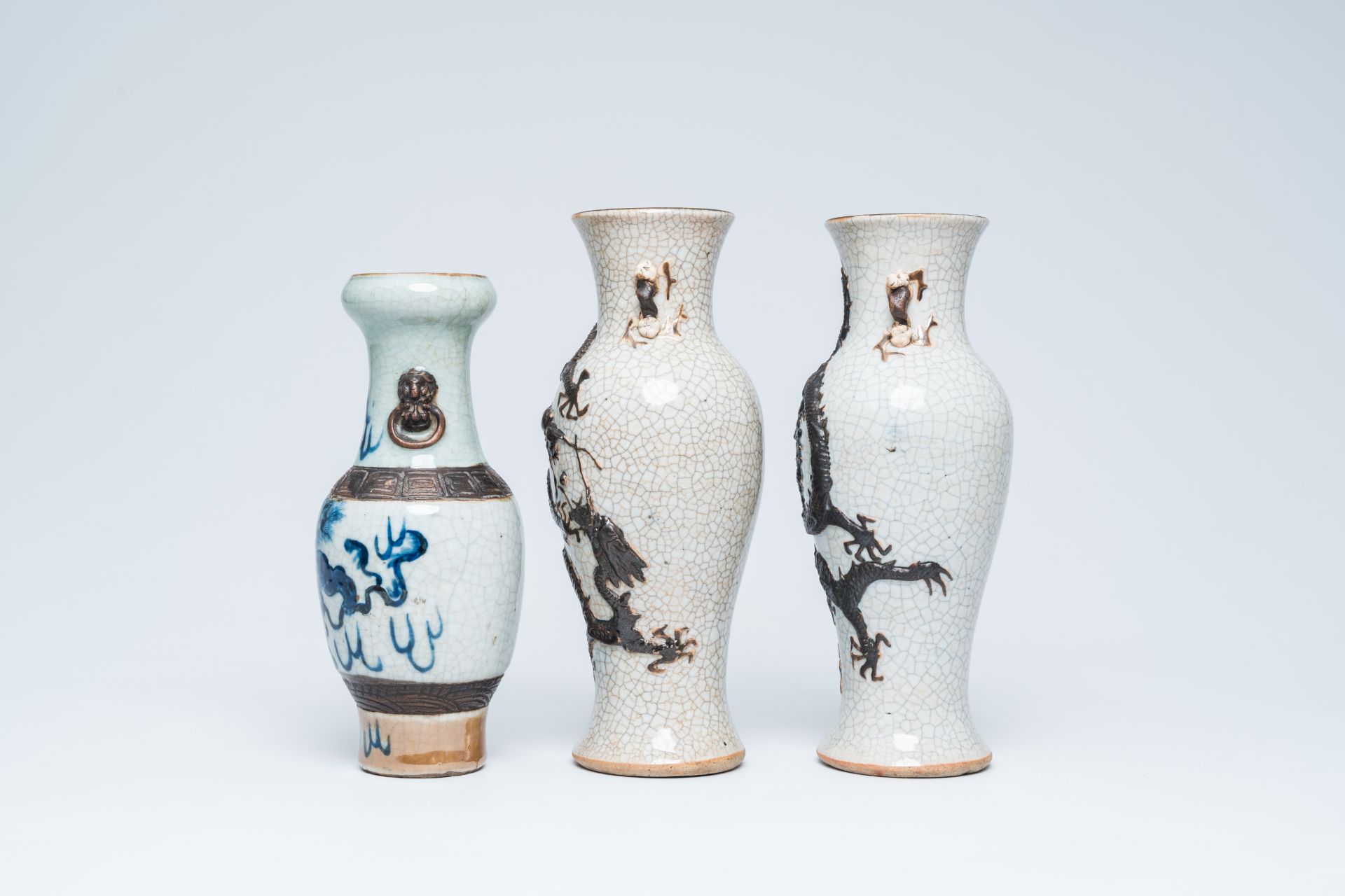 A pair of Chinese Nanking crackle glazed relief decorated 'dragon' vases and a blue and white 'Buddh - Image 3 of 16