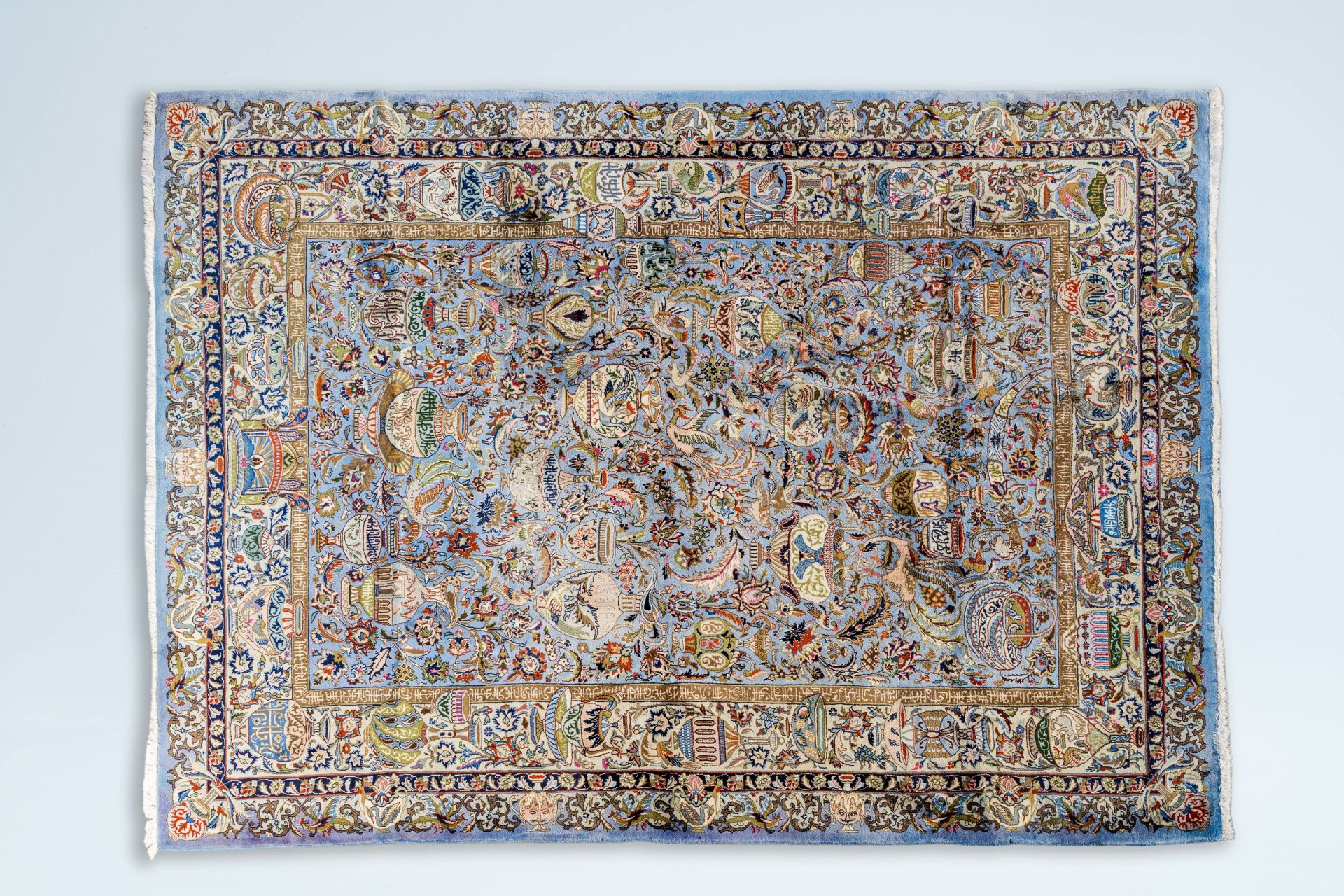 A large Iranian Kashmir rug with antiquities, animals and floral design, wool on cotton, 20th C.