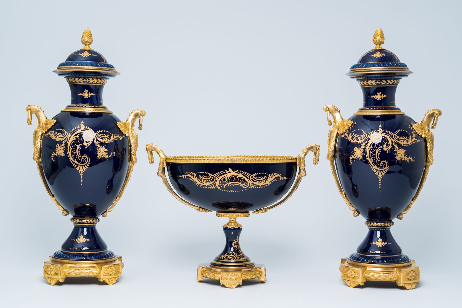 A French gilt mounted blue ground gold layered three-piece garniture with lovely scenes by Lebret, S - Image 3 of 6