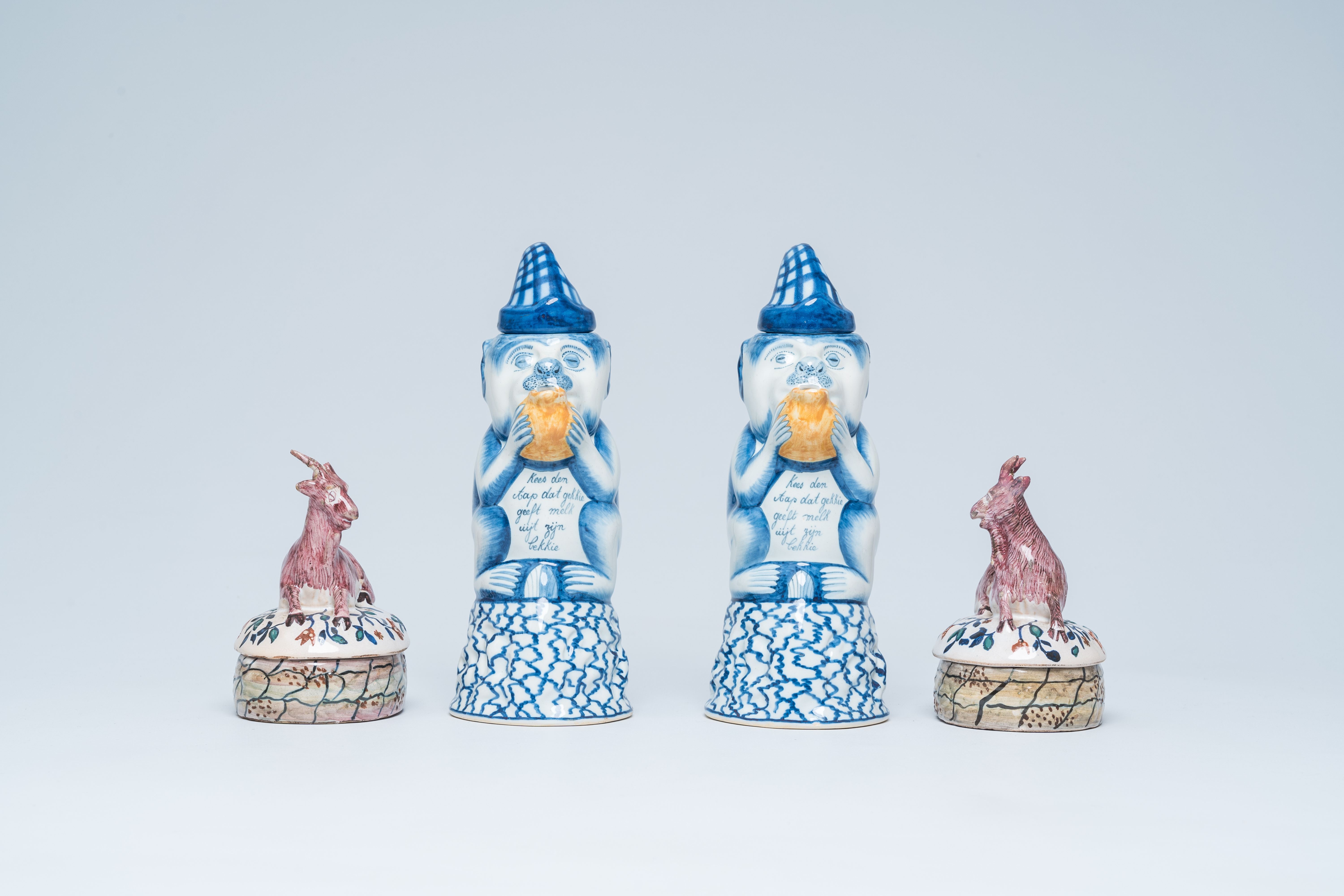 Two polychrome Dutch monkey ewers and two butter tubs with goat-shaped covers, Delft and Makkum, 19t - Image 3 of 7