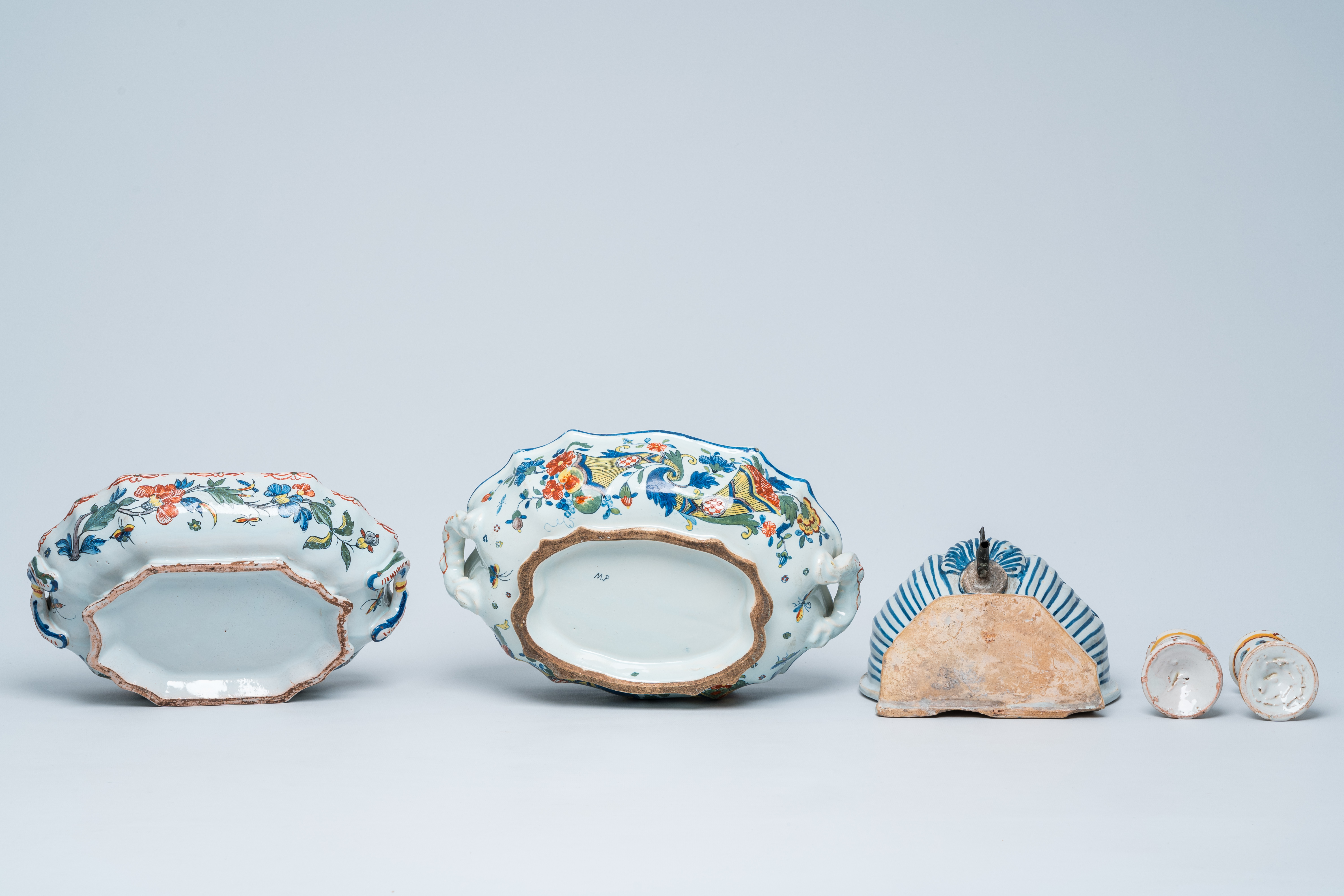 Two polychrome French Rouen faience tureens and covers, a pair of egg cups and a wall fountain, 18th - Image 7 of 9