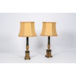 A pair of French gilt and patinated bronze Empire style 'Carcel' table lamps, Maison Gotten, 19th/20