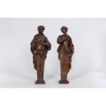 An elegant pair of carved and patinated wood caryatids, 18th C.