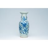 A Chinese blue and white celadon ground 'Buddhist lions' vase, 19th C.
