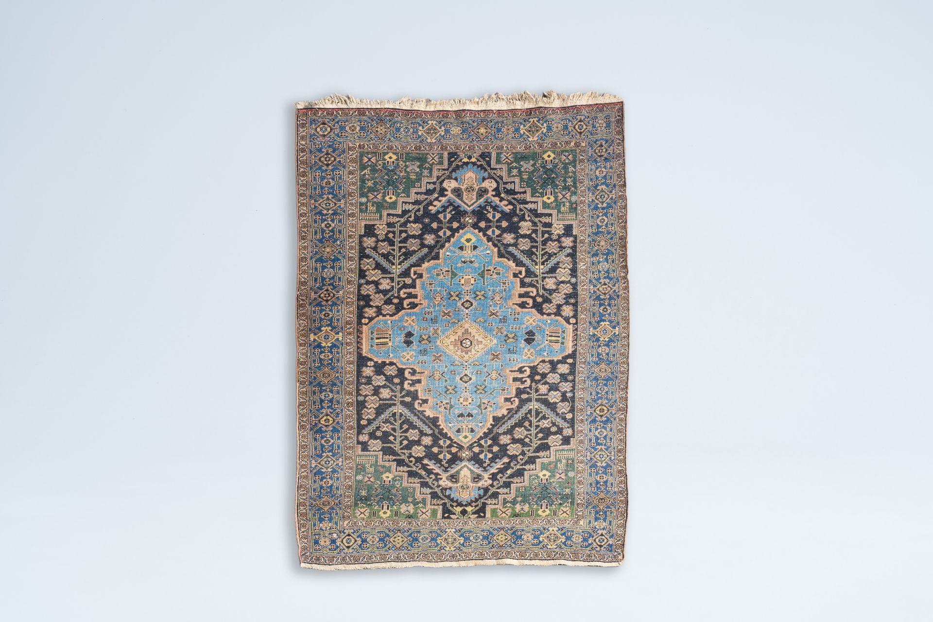 An oriental rug with geometric design, wool on cotton, 20th C. - Image 2 of 3