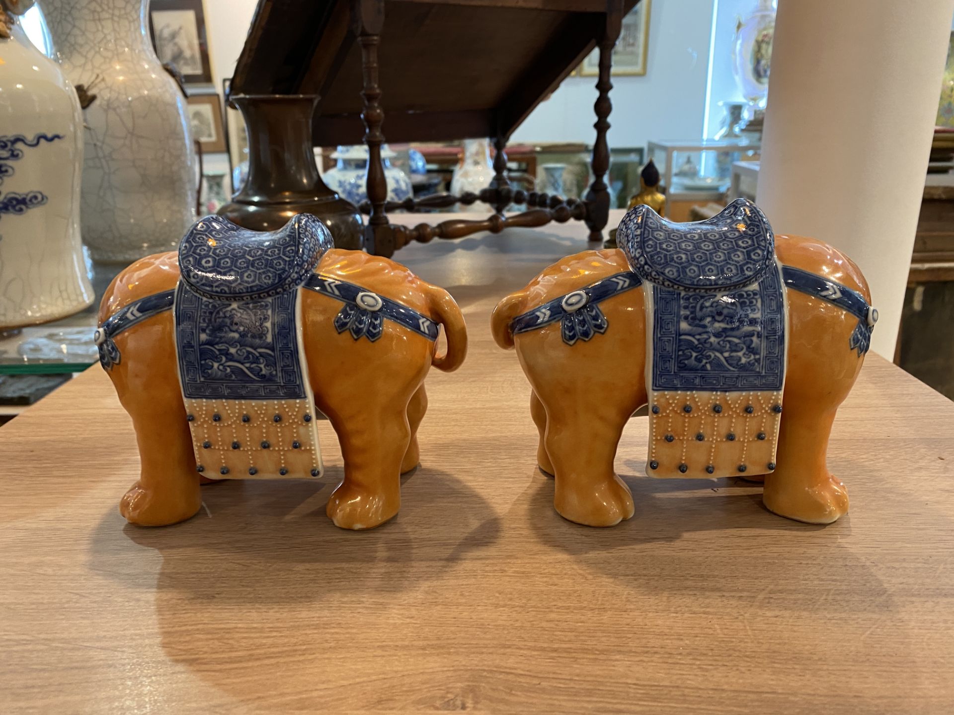 A pair of Chinese polychrome models of elephants, 20th C. - Image 11 of 15
