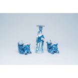 A Delft style blue and white 'muse' candlestick and two match holders in the shape of bears, probabl