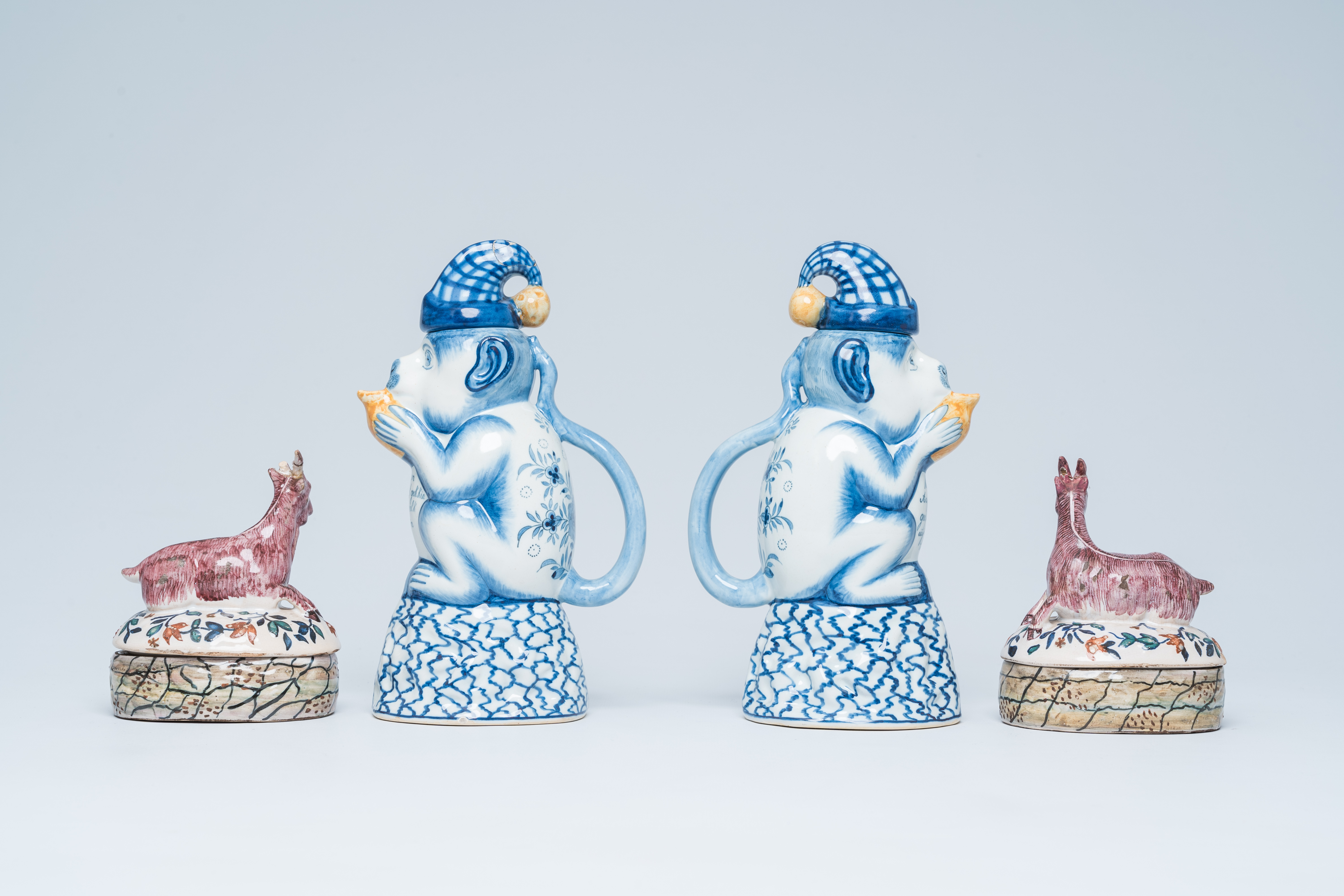 Two polychrome Dutch monkey ewers and two butter tubs with goat-shaped covers, Delft and Makkum, 19t - Image 4 of 7