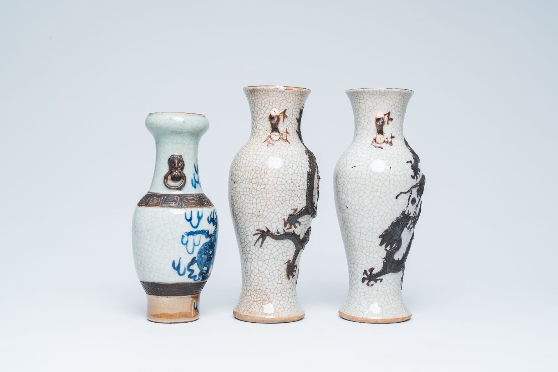 A pair of Chinese Nanking crackle glazed relief decorated 'dragon' vases and a blue and white 'Buddh - Image 5 of 16