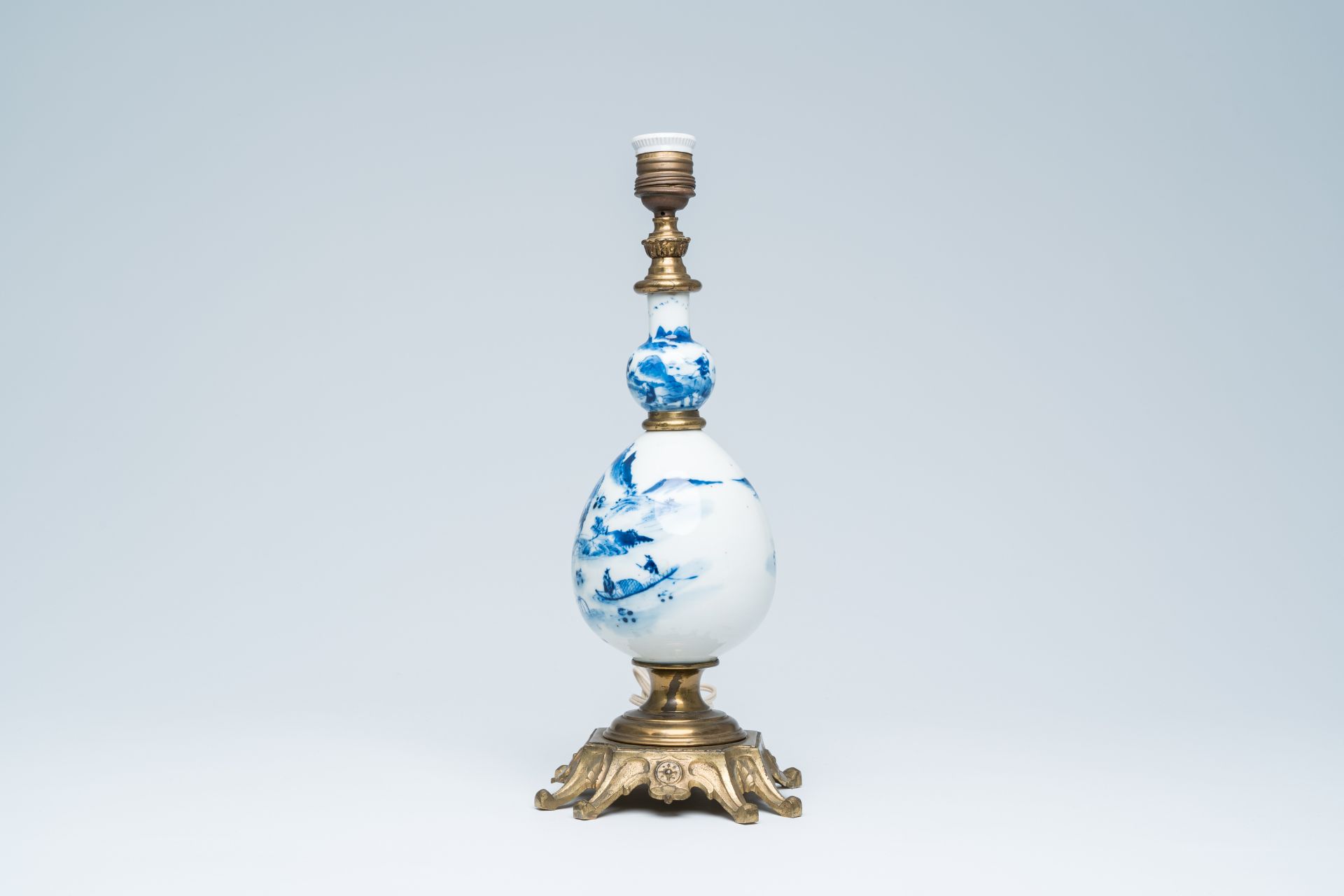 A Chinese blue and white bottle shaped vase with an animated river landscape mounted as a lamp, 19th - Image 2 of 13