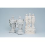 An alabaster sculpture after the antique presumably depicting orpheus and two muses and a pair of bi