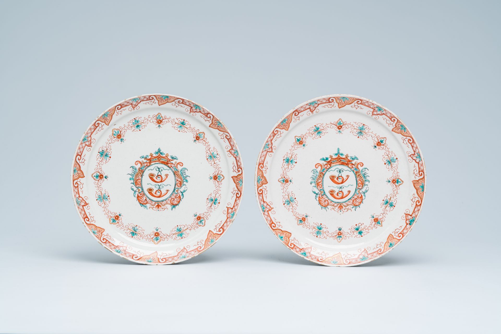 A pair of polychrome Dutch Delft 'dore' armorial plates, dated 1728 - Image 2 of 3