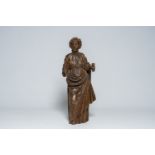 A Flemish oak sculpture of a Saint with traces of a polychromy, 16th/17th C.