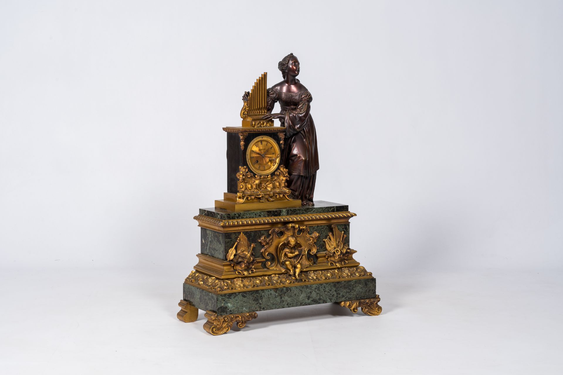 A French patinated and gilt bronze mounted vert de mer marble mantel clock crowned with Saint Cecili - Image 2 of 10