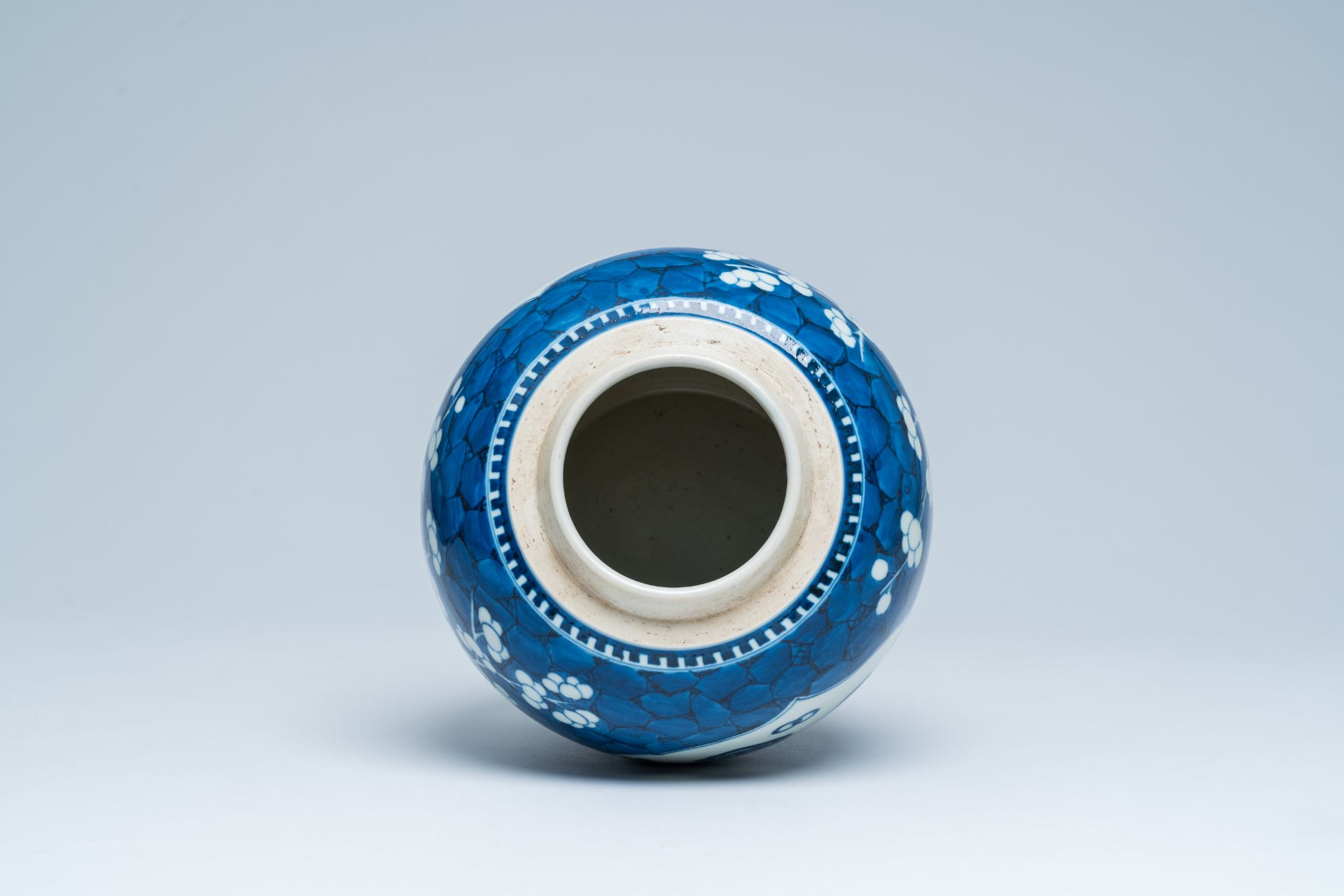 A Chinese blue and white prunus on cracked ice ground ginger jar with antiquities, 20th C. - Image 5 of 15