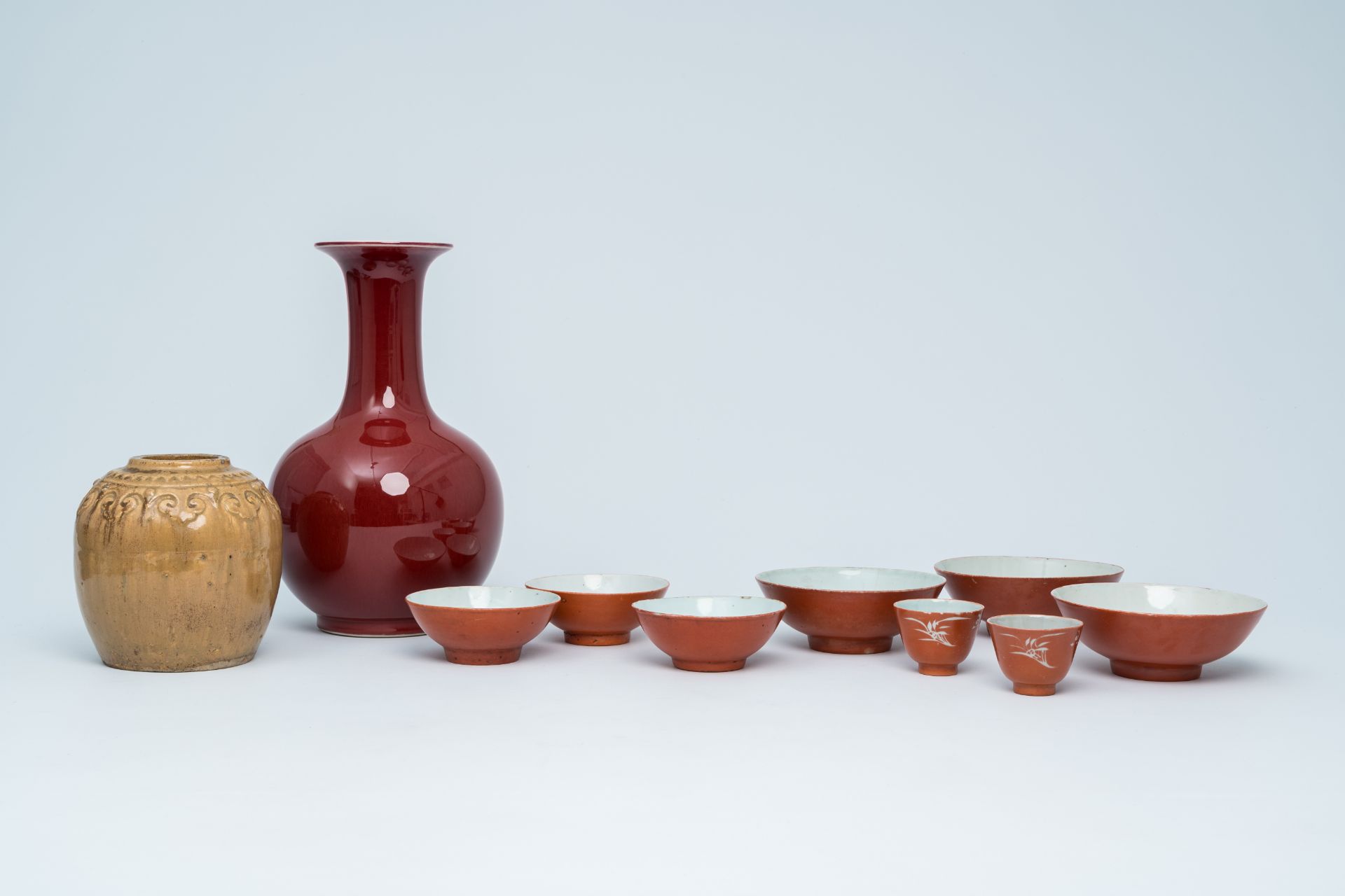 A varied collection of Chinese monochrome porcelain, comprising a jar, a vase, six bowls and two cup