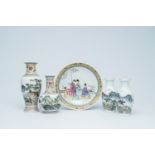 A Chinese famille rose charger with ladies on a terrace and four vases with horses and landscapes, 2