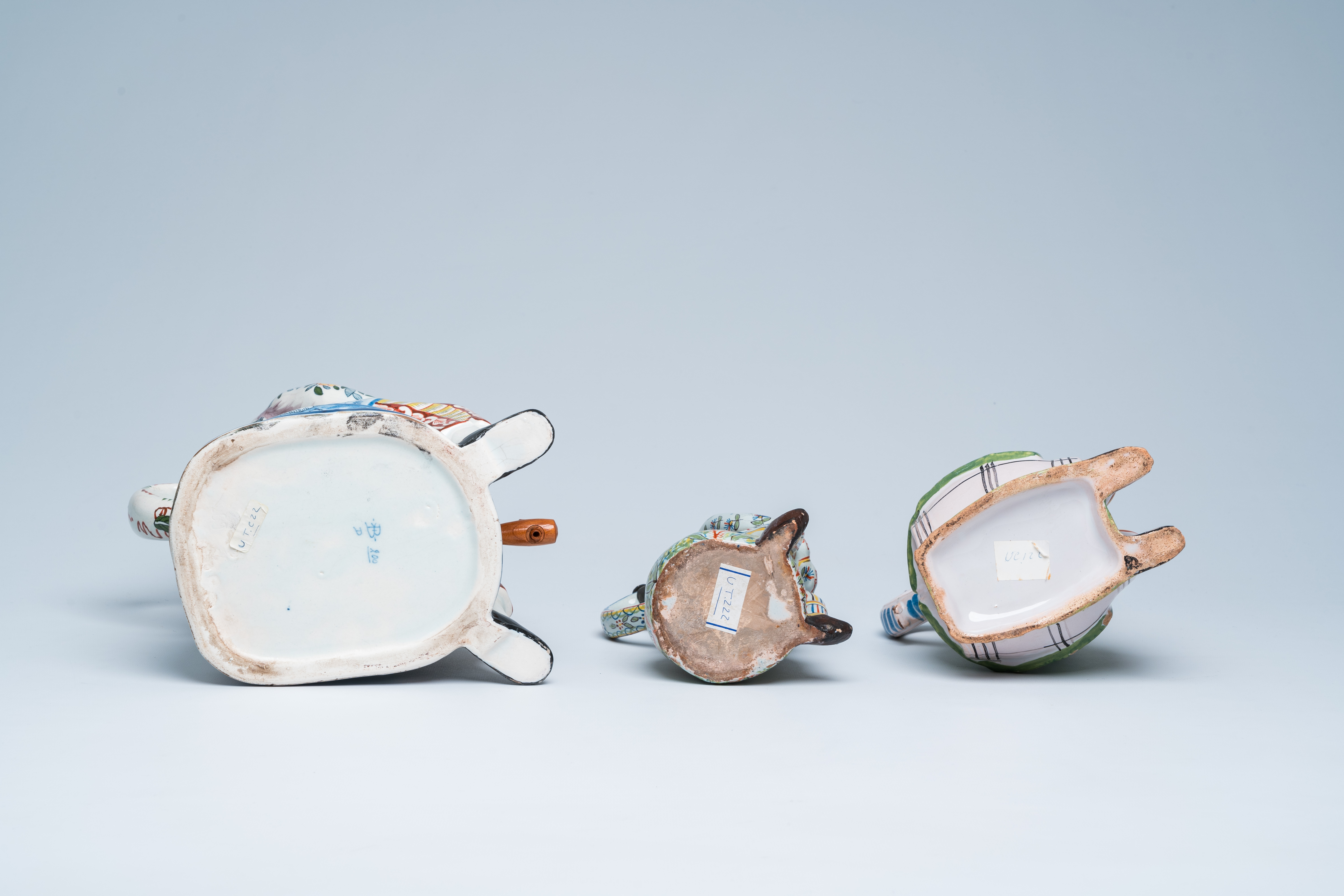 Three polychrome Delft and French faience 'bobbejak' jugs in the shape of men, 19th C. - Image 8 of 8