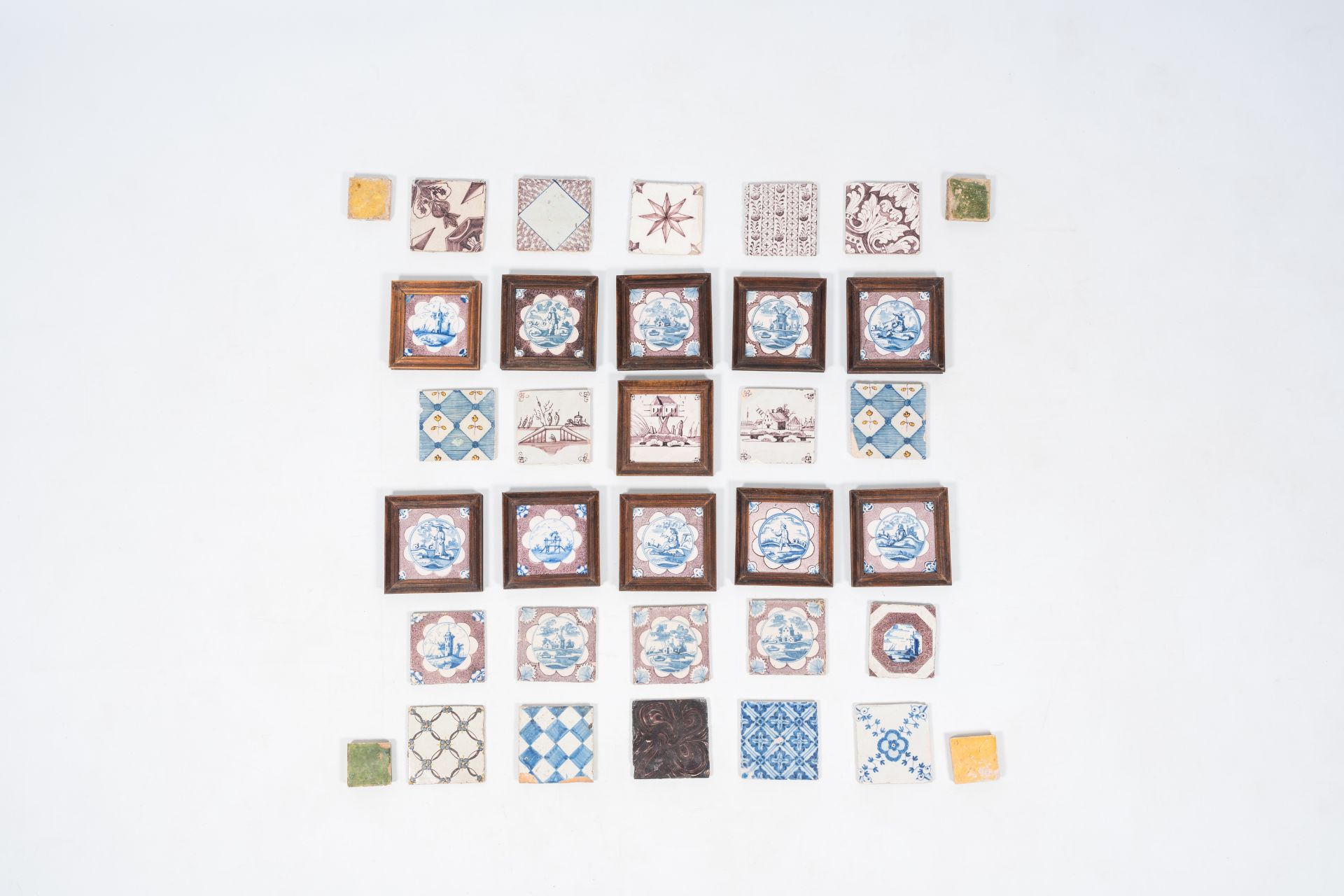30 blue, white and managese Dutch Delft tiles and four medieval tiles, mostly 17th/18th C.