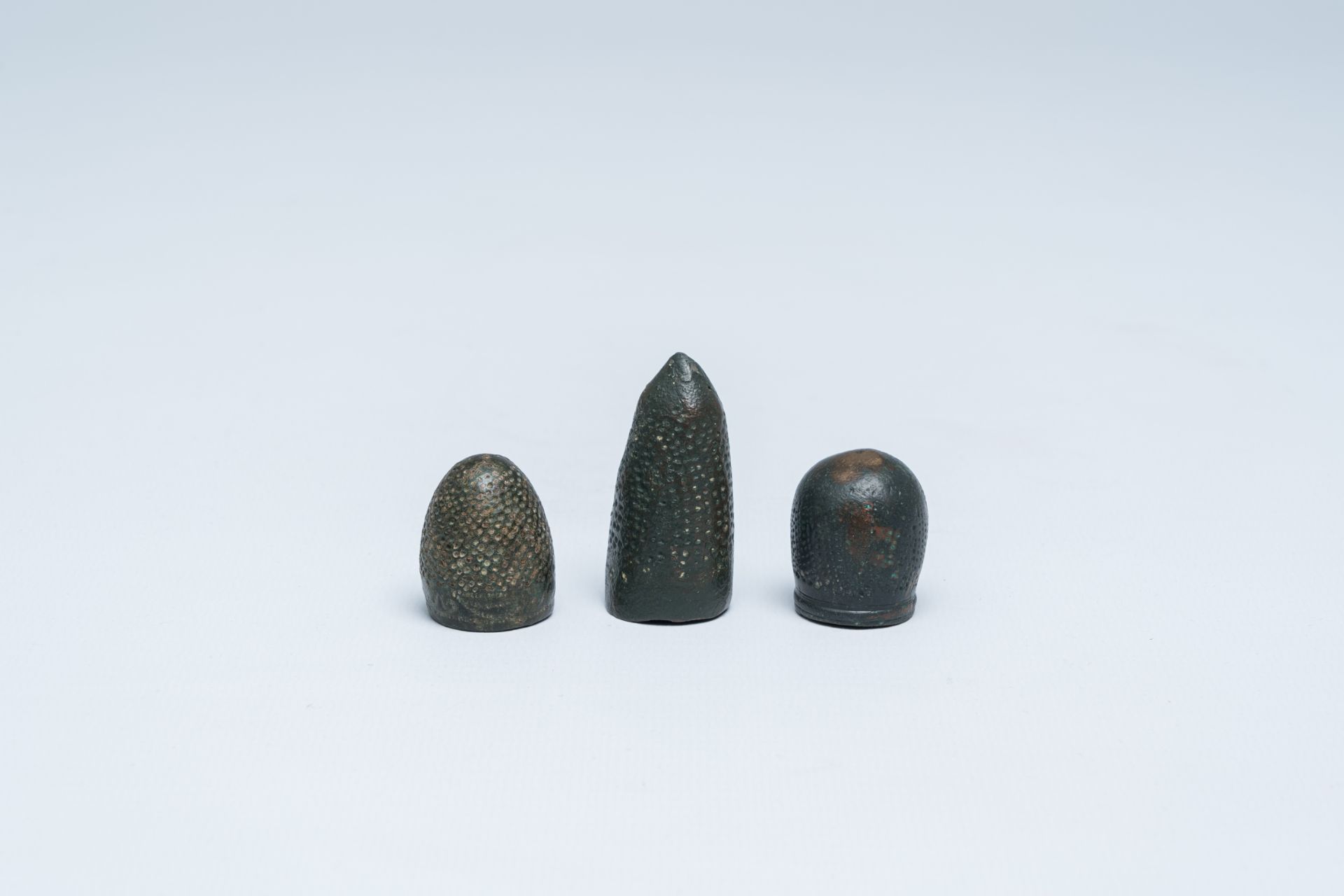 Three Moorish bronze thimbles, 9th/10th C.