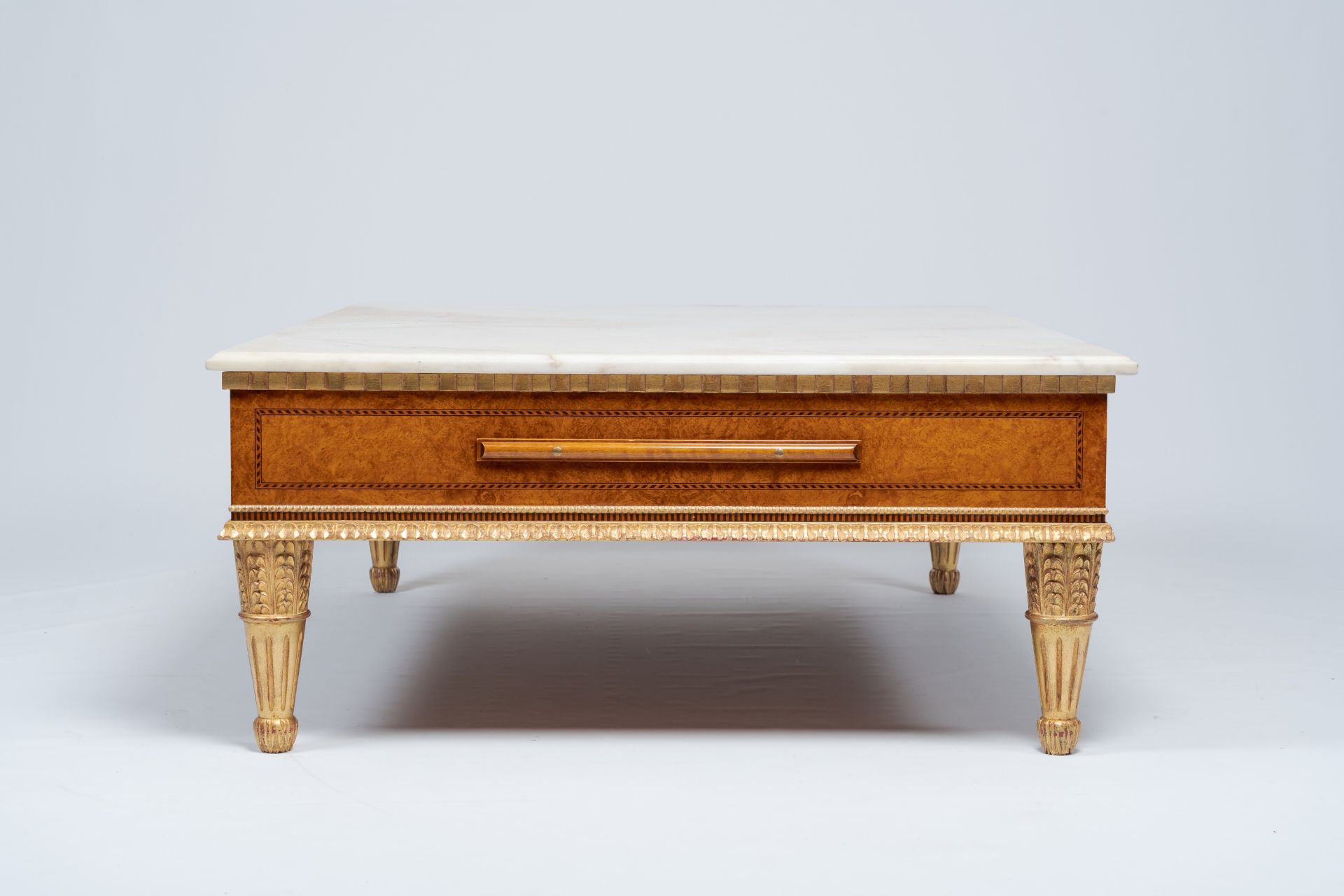 A Neoclassical partly gilt wood coffee table with marble top and four extendable plateaus, 20th C. - Image 8 of 8