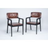 Olivier De Schrijver (1958): A pair of Brighton armchairs in double-sided brown leather and black ti