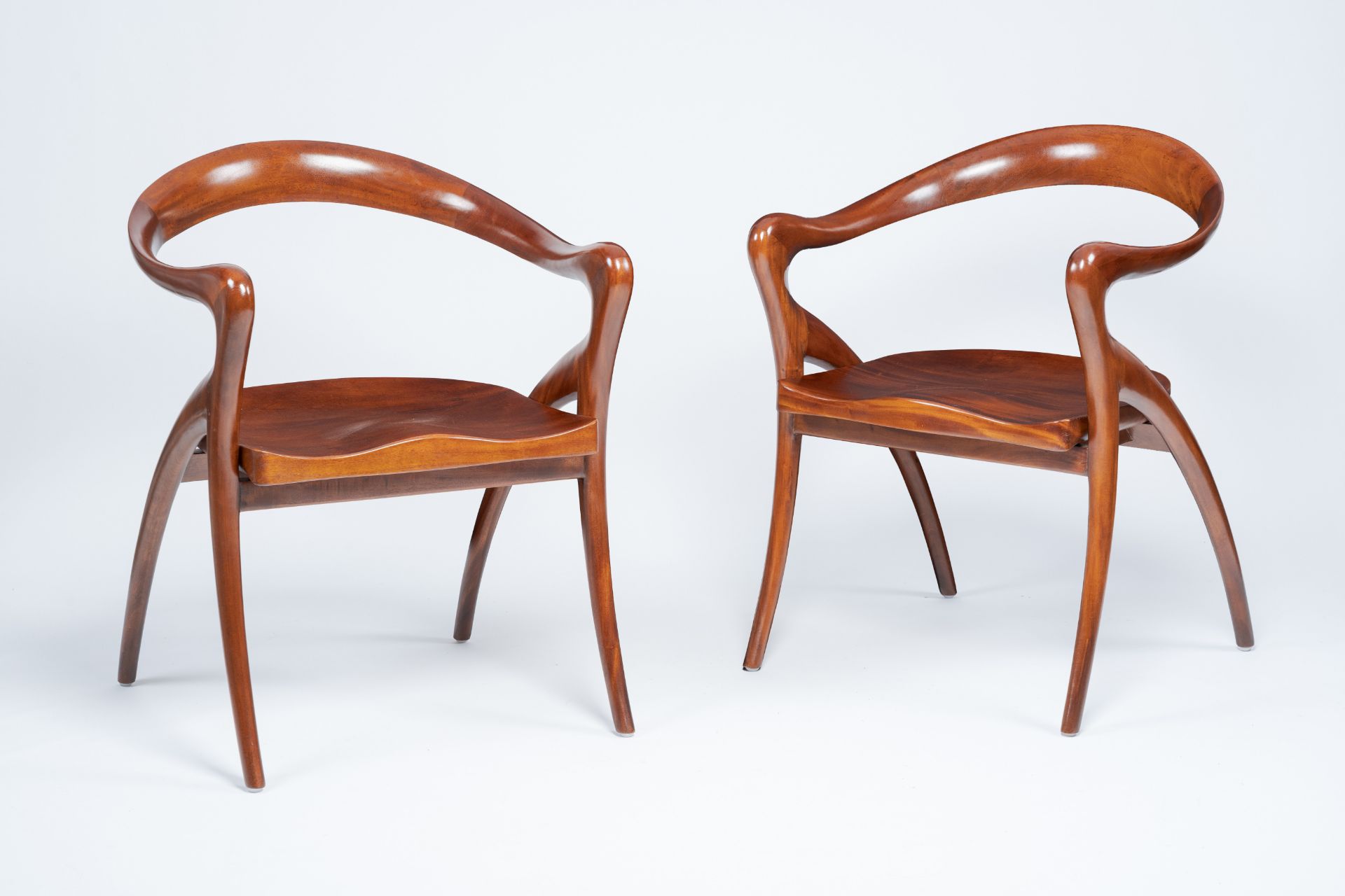 Olivier De Schrijver (1958): A pair of elegant mahogany 'Love' armchairs, ed. 127 and 128/240, 21st