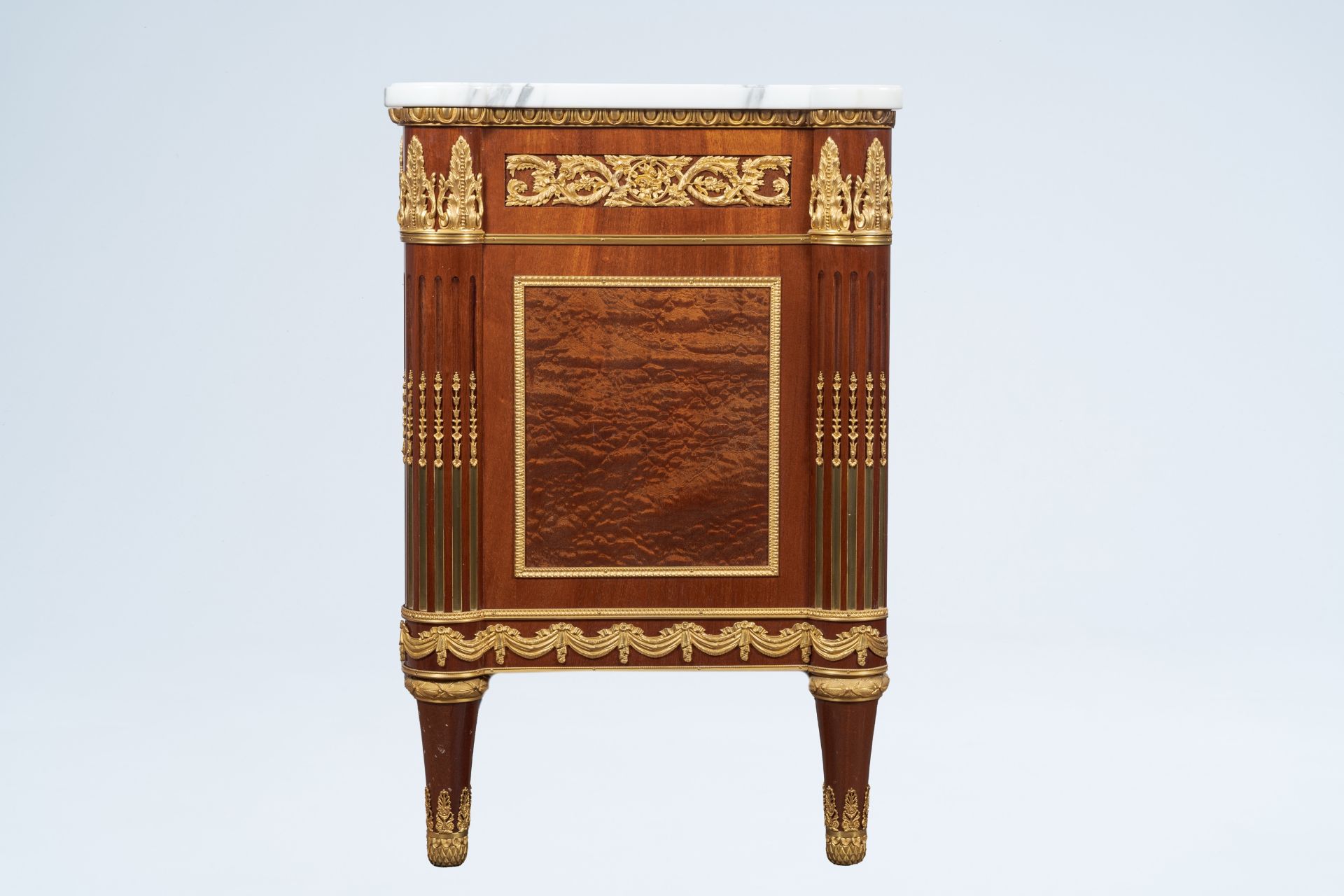 An impressive Neoclassical gilt bronze mounted wood chest of drawers with marble top, 20th C. - Image 9 of 10