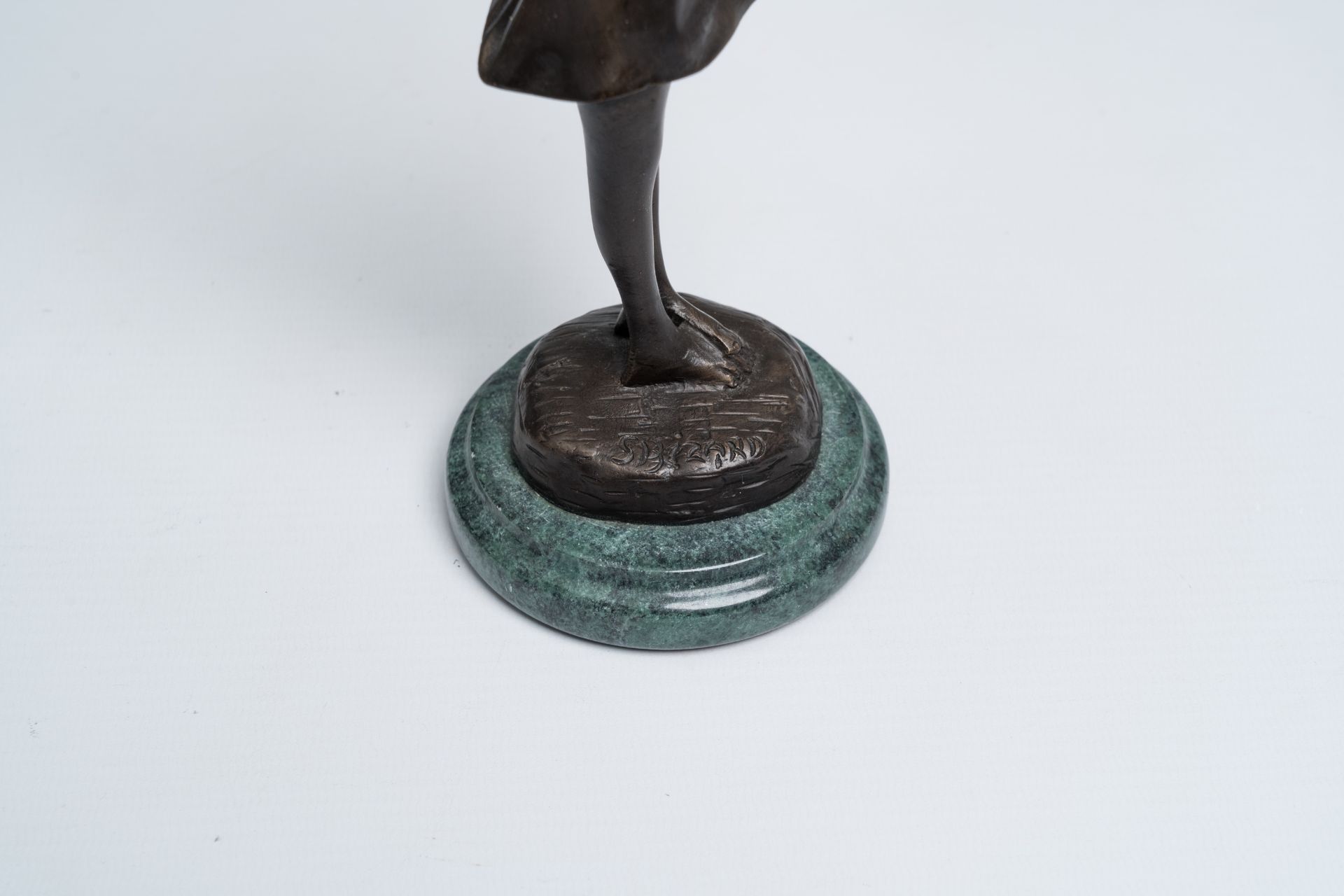 A varied collection of six French bronze sculptures on a marble base, 20th C. - Image 12 of 13