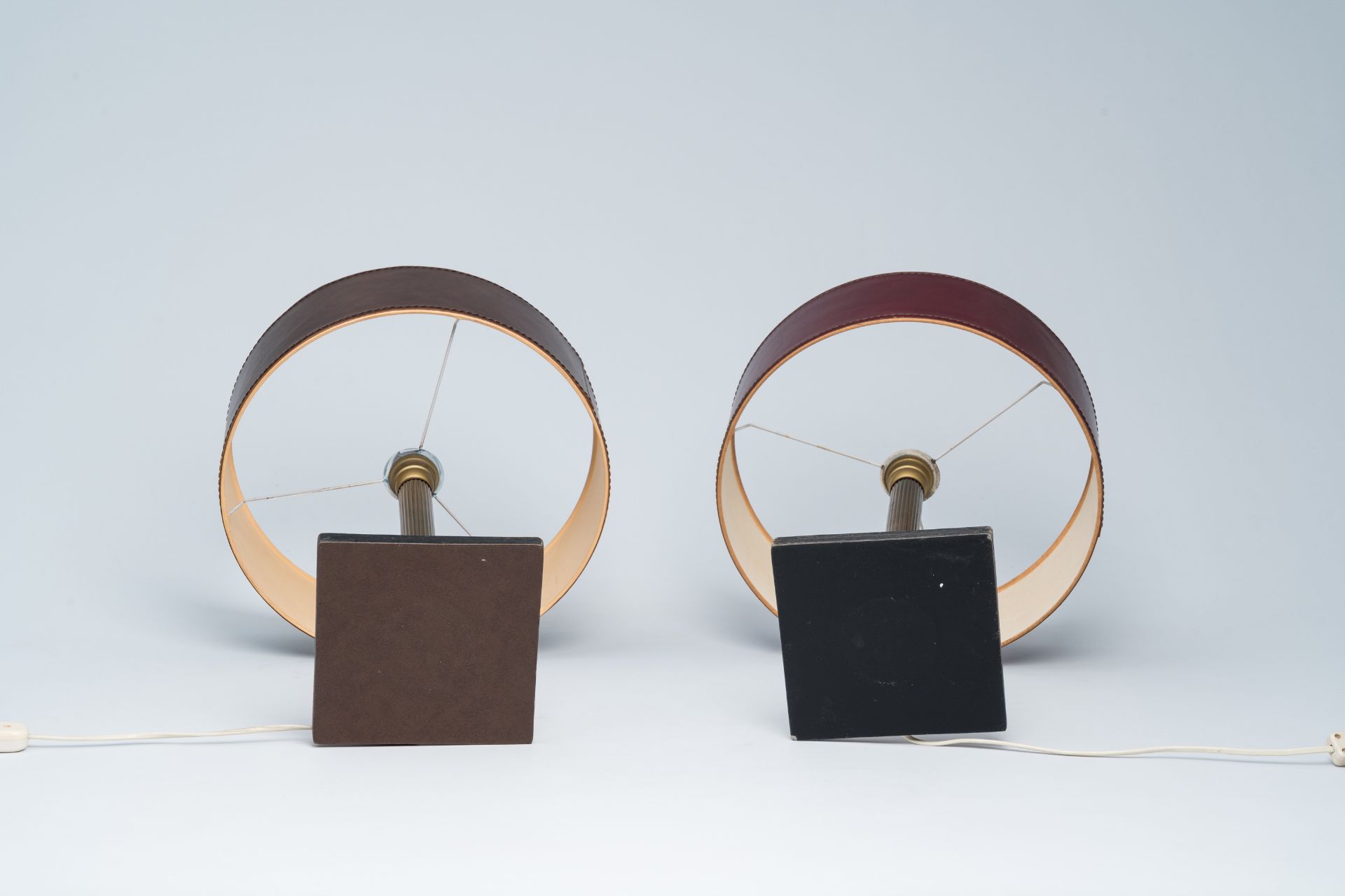 A pair of French brass and leather clad desk lamps after a design by Jacques Adnet, third quarter 20 - Image 7 of 7