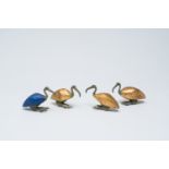 Three Egyptian style ibises in gilt wood and bronze and one in imitation lapis lazuli, 19th/20th C.