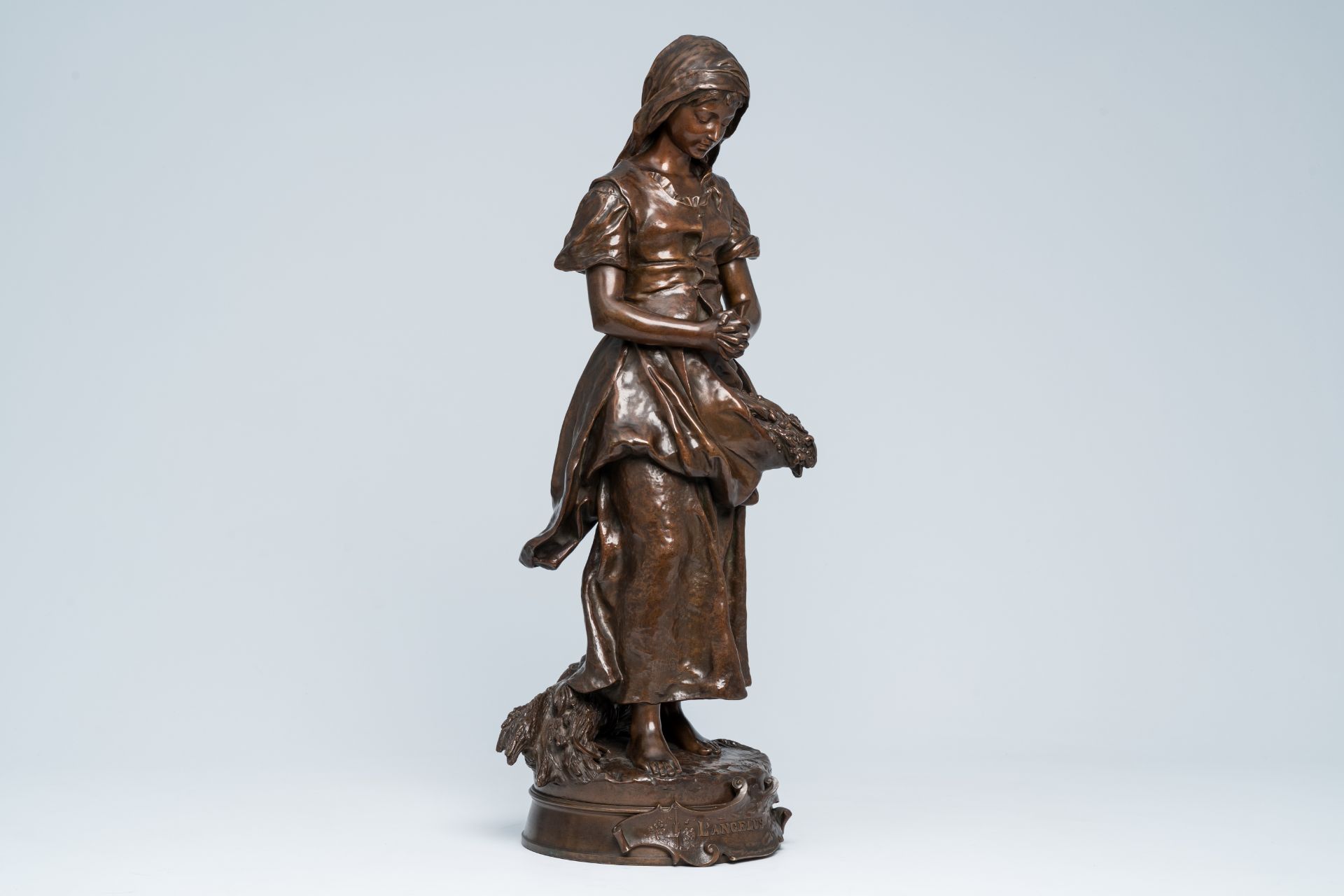 emile Edmond Peynot (1850-1932): 'L'angelus', brown patinated bronze