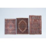 Three various Oriental and Caucasian rugs with geometric design, wool on cotton, first half 20th C.