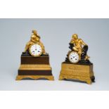 Two French gilt and patinated bronze mantel clocks crowned with 'Geografia' and a young bohemian, 19