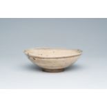 A Korean monochrome crackle glazed 'hakeme' bowl with kintsugi repair, Joseon