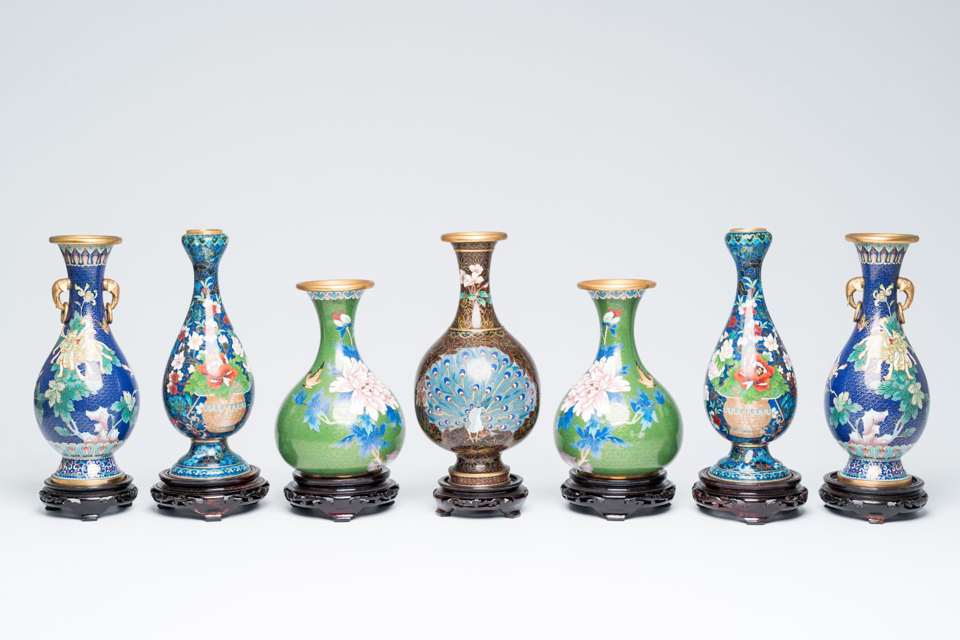 Three pairs of Chinese cloisonne vases with floral design and a 'proud peacock' vase, 20th C.