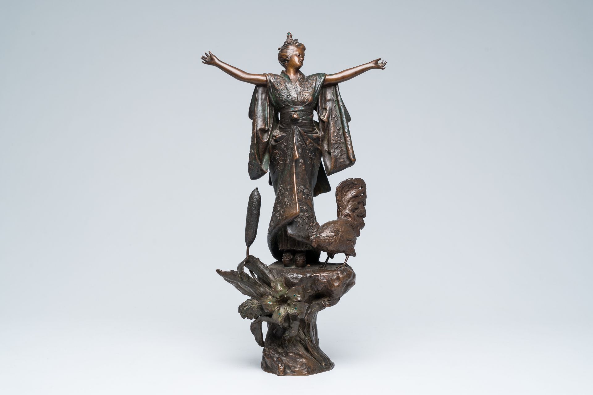 A French patinated bronze sculpture of a Japanese lady with a rooster at the reed with inlay, 20th C - Image 2 of 7