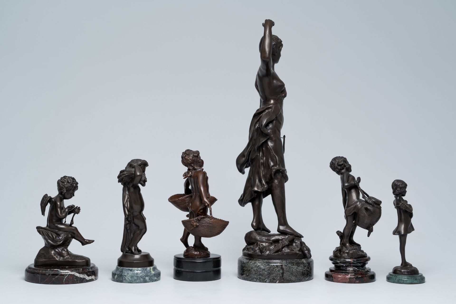 A varied collection of six French bronze sculptures on a marble base, 20th C. - Image 5 of 13