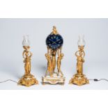 An imposing French three-piece gilt bronze and white marble 'Three Graces' clock garniture, 19th/20t