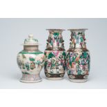 Two Chinese Nanking crackle glazed famille rose 'warrior' vases and a vase and cover with a ceremony