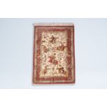 A Persian Nain rug with hunting scenes and calligraphic inscriptions, silk on cotton, marked, Iran,